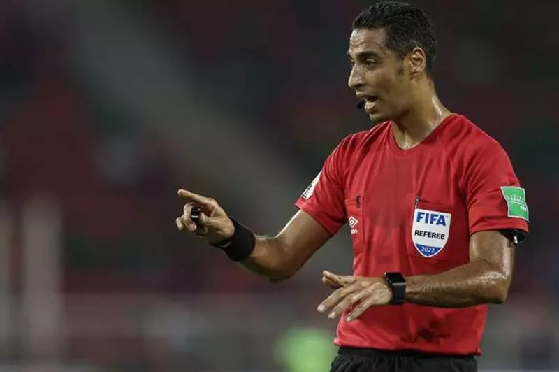 تعيين أمين عمر حكماً لمباراة الأهلي وفاركو: إعلان رسمي